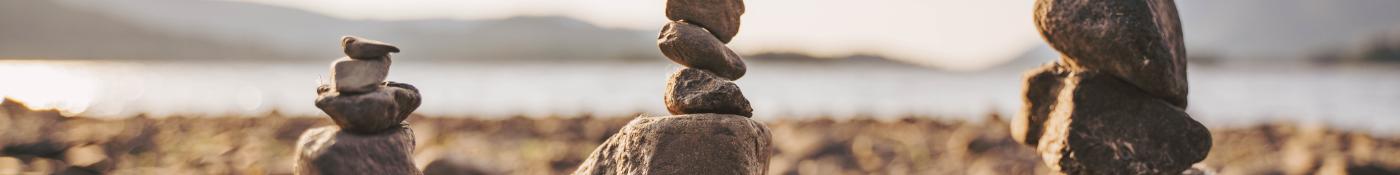 Tower of balancing rocks on beach